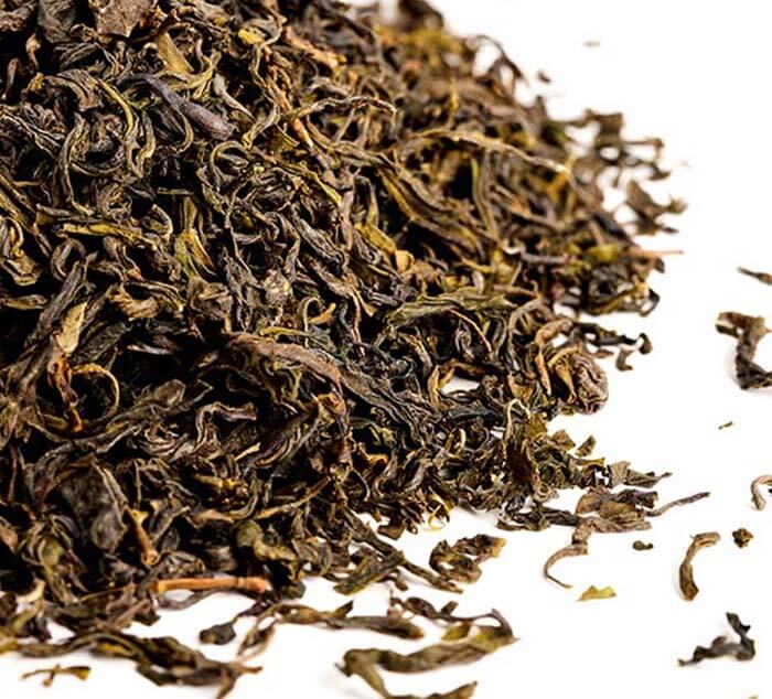 clouds and mist green tea in a pile