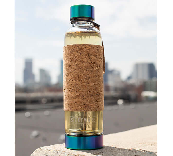 Urban Tea Tumbler with cork sleeve and colorful bottom lid designed for loose leaf tea in urban setting.